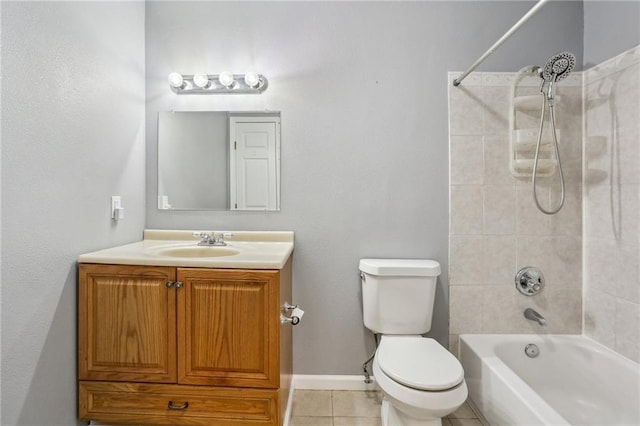 full bathroom featuring tile patterned flooring, tiled shower / bath combo, toilet, and vanity