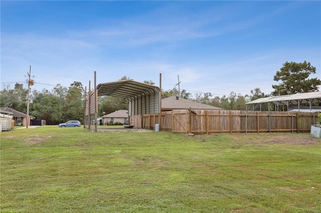 view of yard with a carport