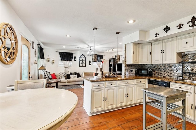 kitchen with dark stone counters, stainless steel dishwasher, decorative backsplash, decorative light fixtures, and kitchen peninsula