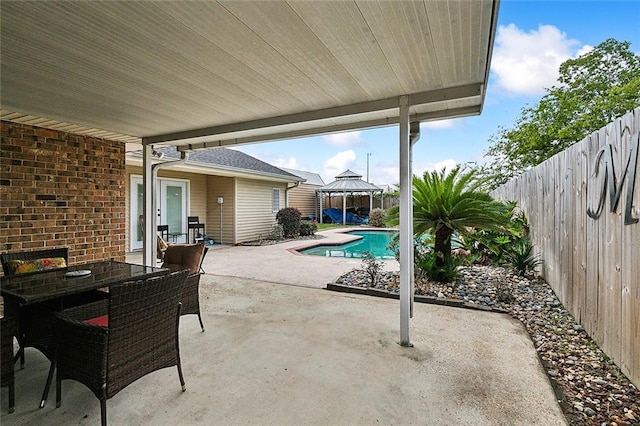 view of pool with a gazebo and a patio