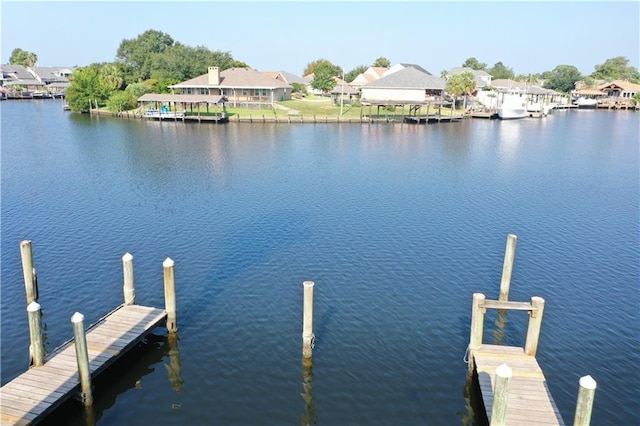 dock area featuring a water view