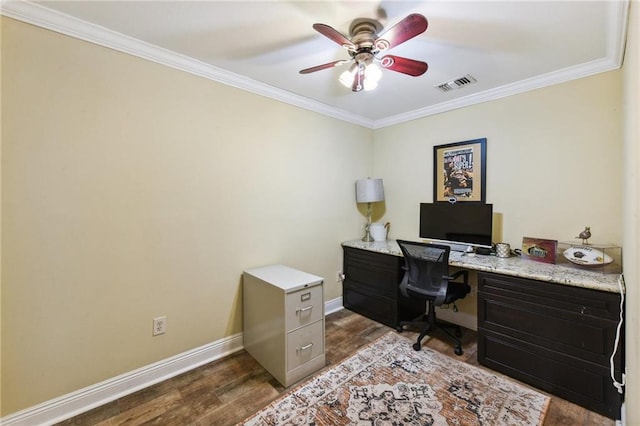 office with dark hardwood / wood-style floors, ceiling fan, and ornamental molding