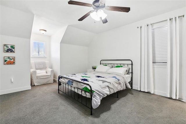 bedroom with ceiling fan, carpet, and lofted ceiling