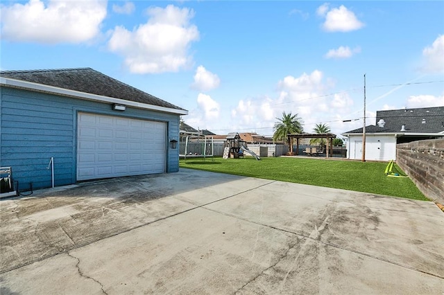 garage with a yard