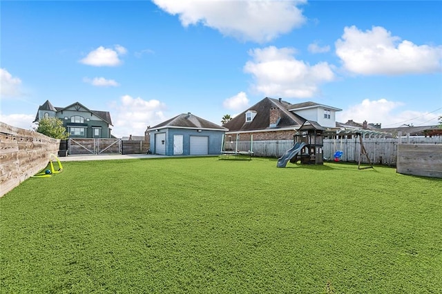 view of yard featuring a playground, an outdoor structure, and a trampoline