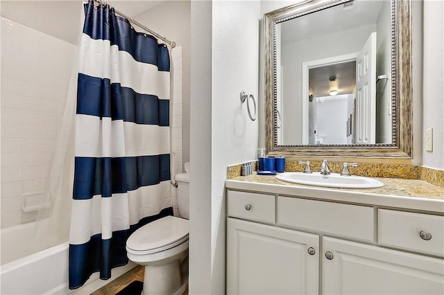 full bathroom with vanity, shower / bath combination with curtain, and toilet