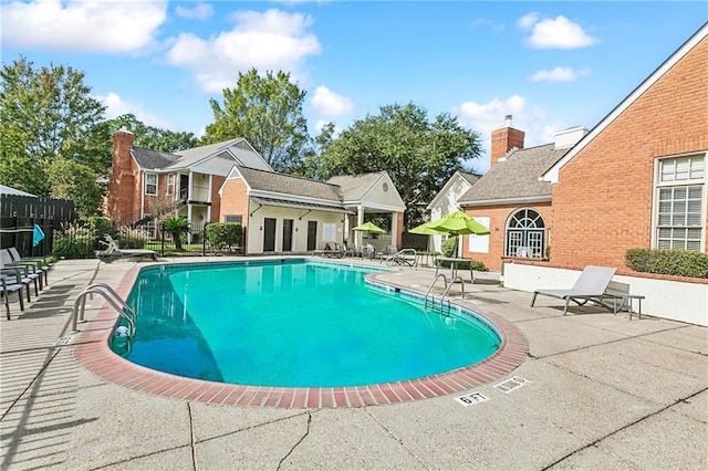 view of pool with a patio area