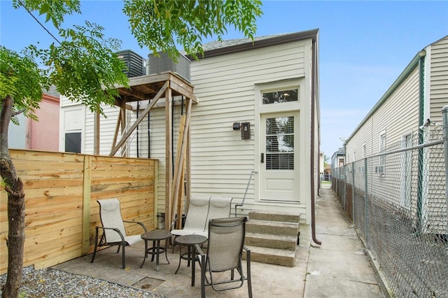 rear view of house with a patio