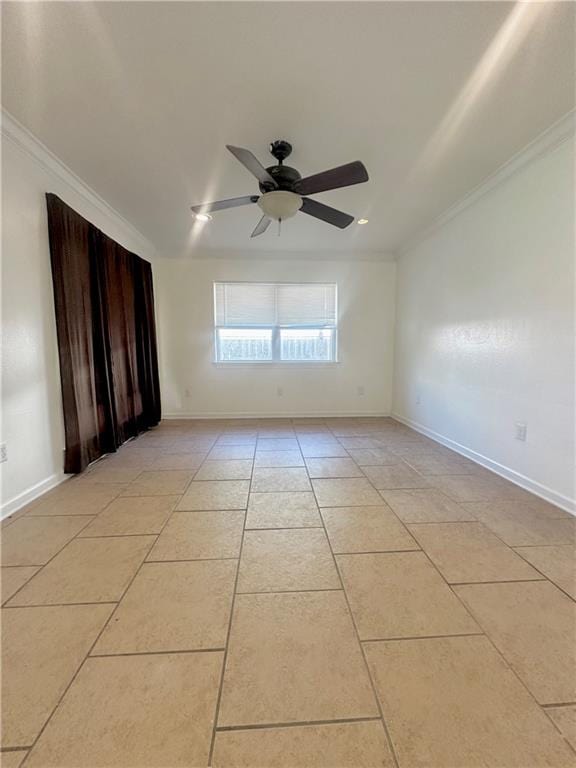 empty room with ceiling fan, crown molding, and light tile patterned flooring