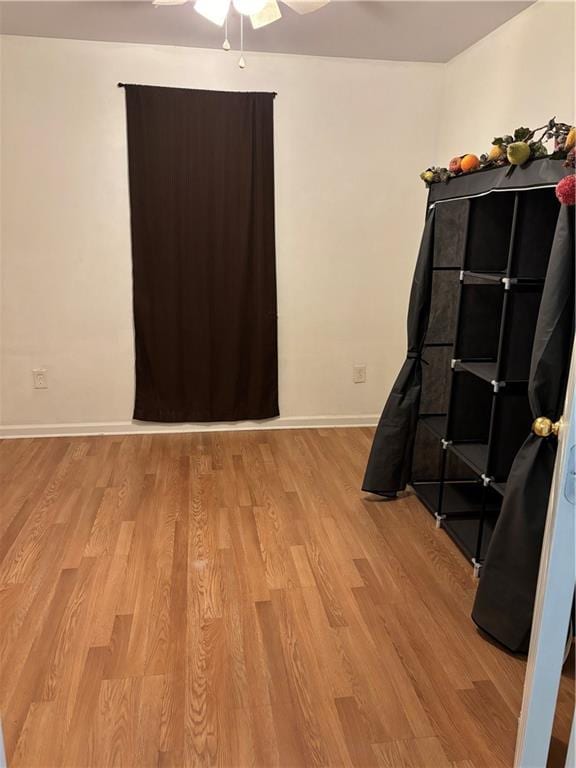 interior space featuring ceiling fan and light hardwood / wood-style flooring