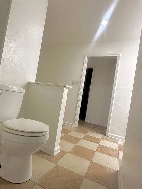 bathroom featuring toilet