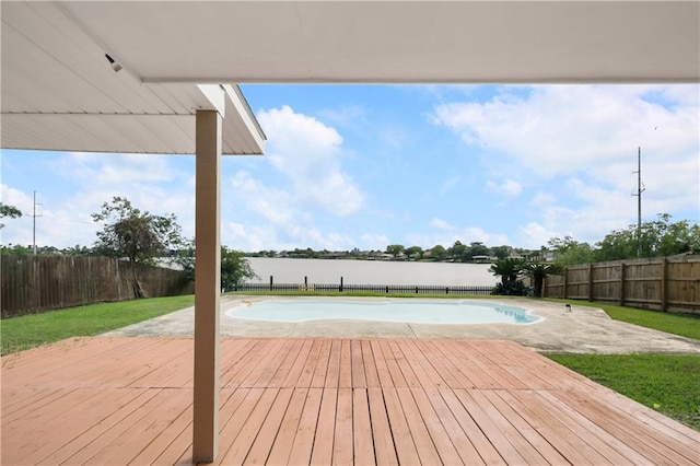 deck with a yard and a fenced in pool