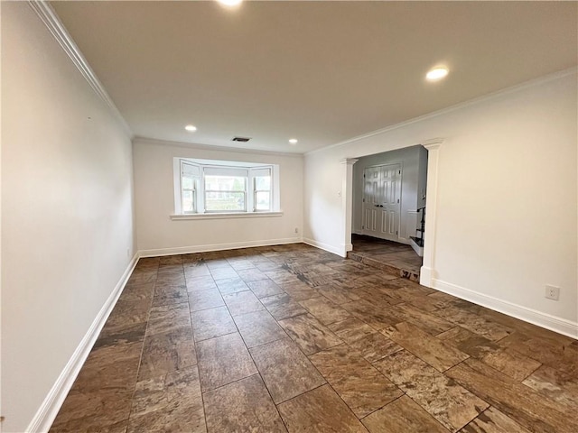 unfurnished room featuring crown molding