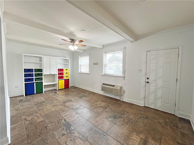 entrance foyer featuring beamed ceiling, ceiling fan, crown molding, and a wall unit AC