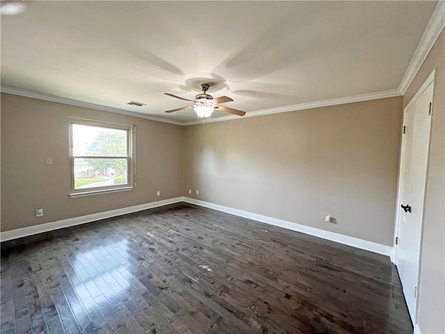 empty room with ceiling fan, crown molding, and dark wood-type flooring