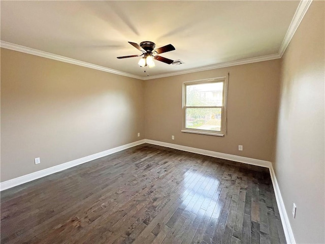 unfurnished room featuring ceiling fan, dark wood-type flooring, and ornamental molding