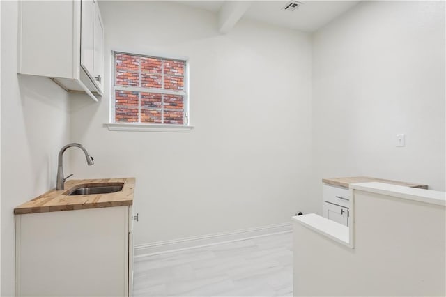 laundry room featuring sink