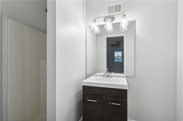 bathroom with vanity and ceiling fan