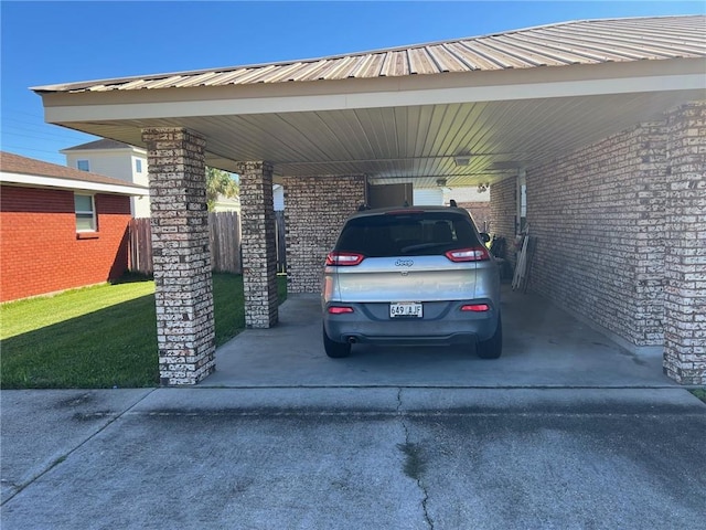 view of parking featuring a carport and a lawn