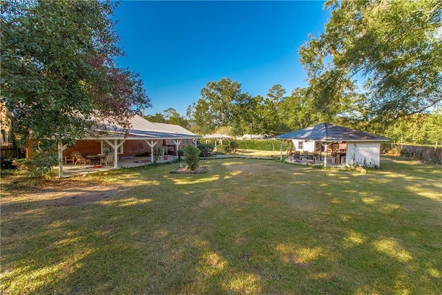 view of yard with a patio area