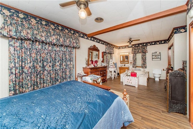 bedroom featuring ceiling fan, wood-type flooring, and ornamental molding