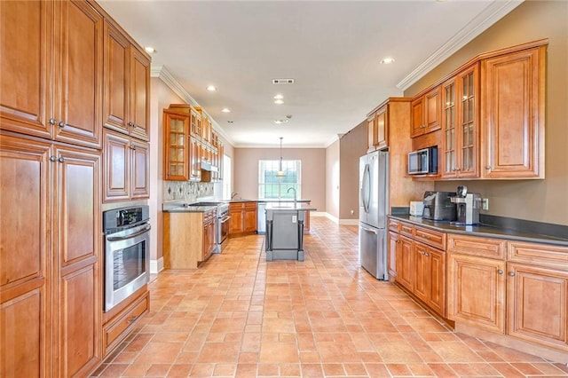 kitchen with backsplash, ornamental molding, a breakfast bar, stainless steel appliances, and decorative light fixtures