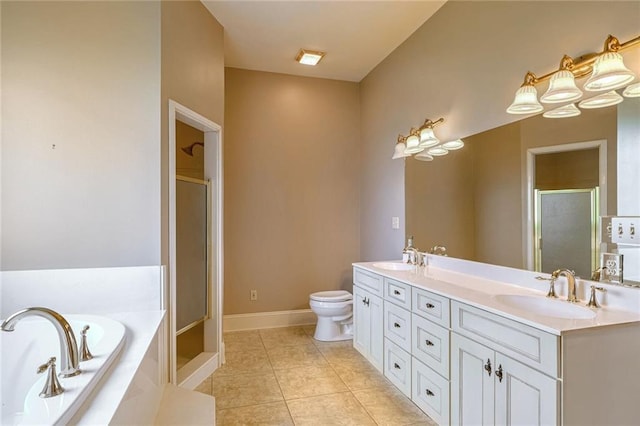 full bathroom with tile patterned flooring, vanity, independent shower and bath, and toilet