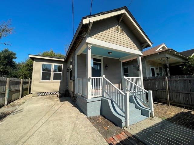 bungalow-style home featuring covered porch