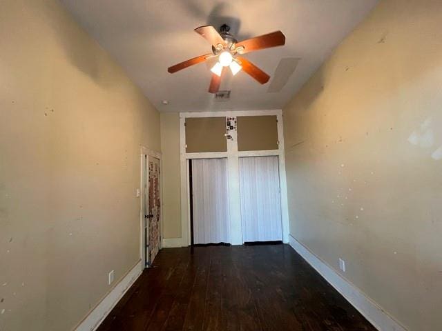 unfurnished bedroom with wood-type flooring and ceiling fan