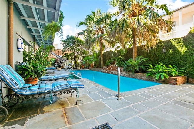 view of pool with a patio area