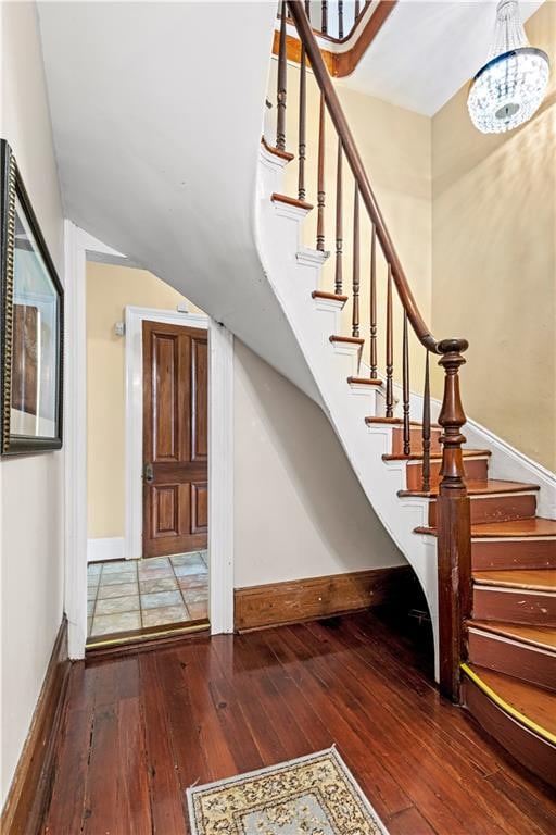 stairway with wood-type flooring