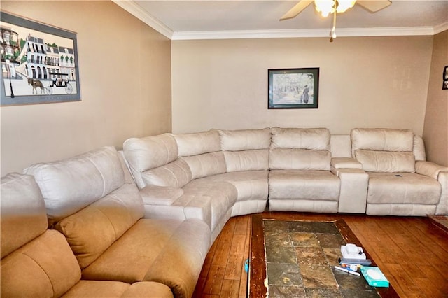 living room featuring hardwood / wood-style flooring, ceiling fan, and ornamental molding