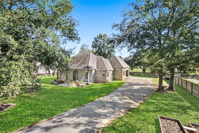 view of front of house with a front lawn