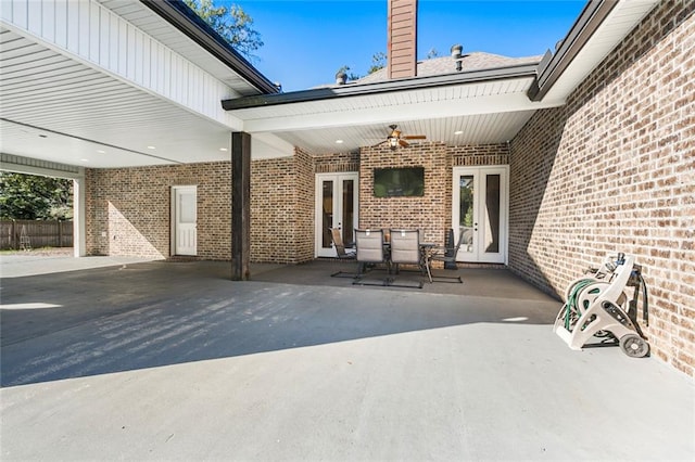 view of patio with ceiling fan and french doors