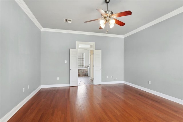 unfurnished room with hardwood / wood-style flooring, ceiling fan, and crown molding