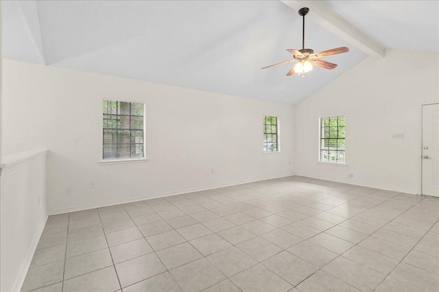 empty room with beamed ceiling, light tile patterned floors, ceiling fan, and a healthy amount of sunlight