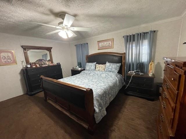 bedroom with ceiling fan, a textured ceiling, dark carpet, and crown molding