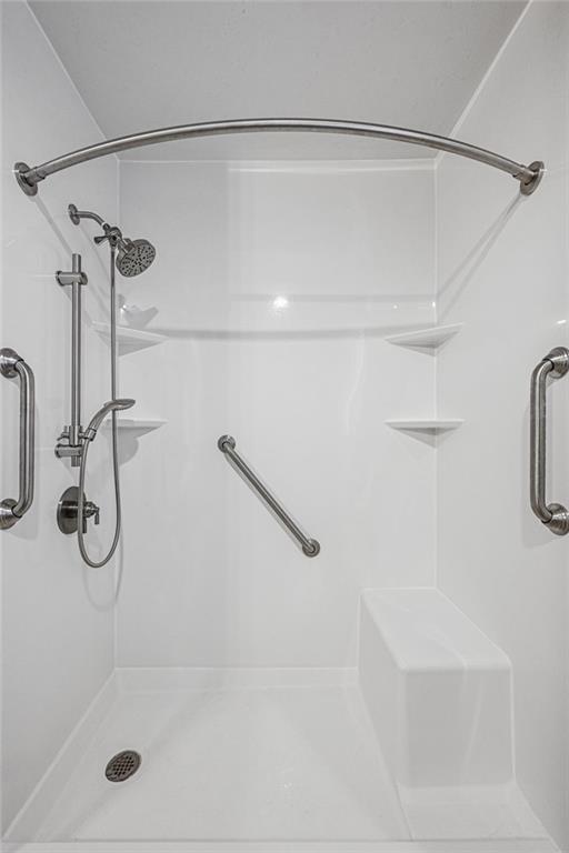 bathroom with walk in shower