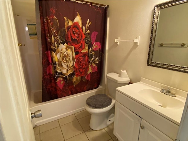 full bathroom featuring tile patterned floors, shower / bath combo, toilet, and vanity