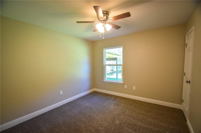 empty room with carpet flooring and ceiling fan