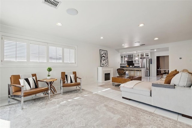 living room featuring light tile patterned flooring