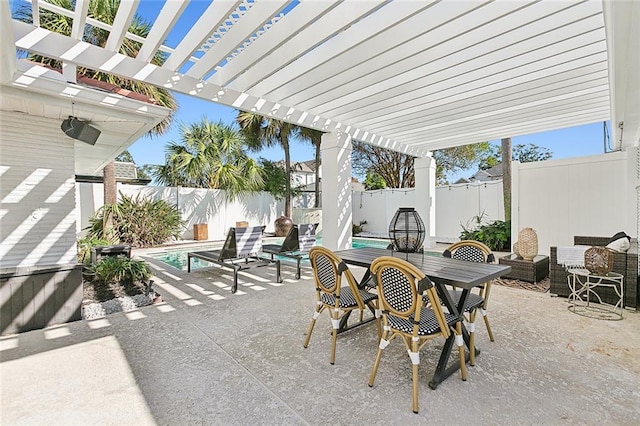 view of patio / terrace with a pergola and a fenced in pool