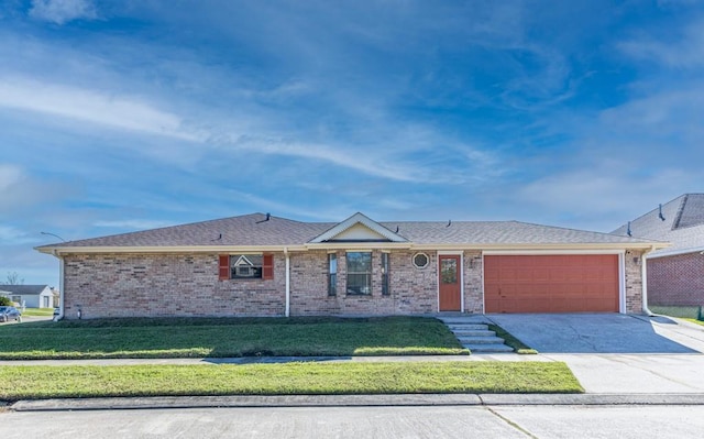 single story home with a front yard and a garage