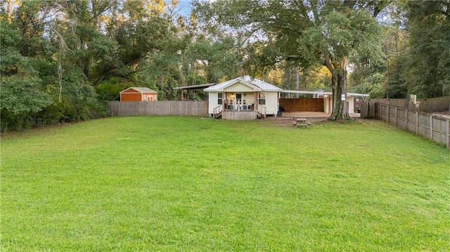 view of yard with covered porch