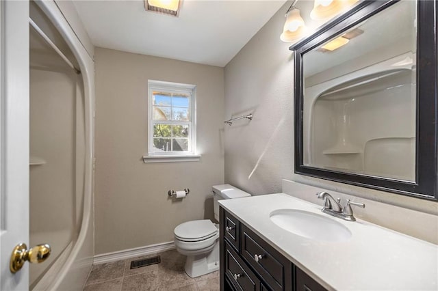 full bathroom with washtub / shower combination, tile patterned flooring, vanity, and toilet