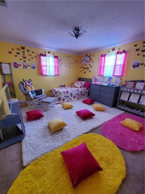 rec room with crown molding and plenty of natural light