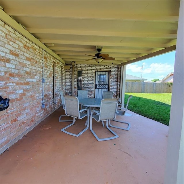 view of patio featuring ceiling fan