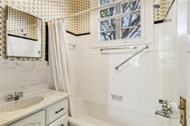 bathroom featuring vanity and shower / tub combo