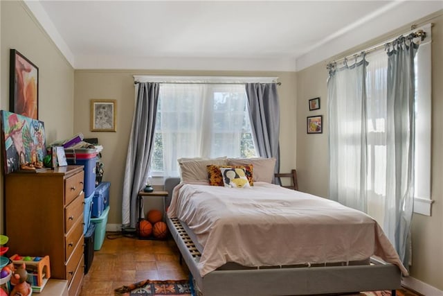 bedroom featuring hardwood / wood-style flooring