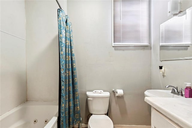 full bathroom featuring vanity, shower / bathtub combination with curtain, and toilet